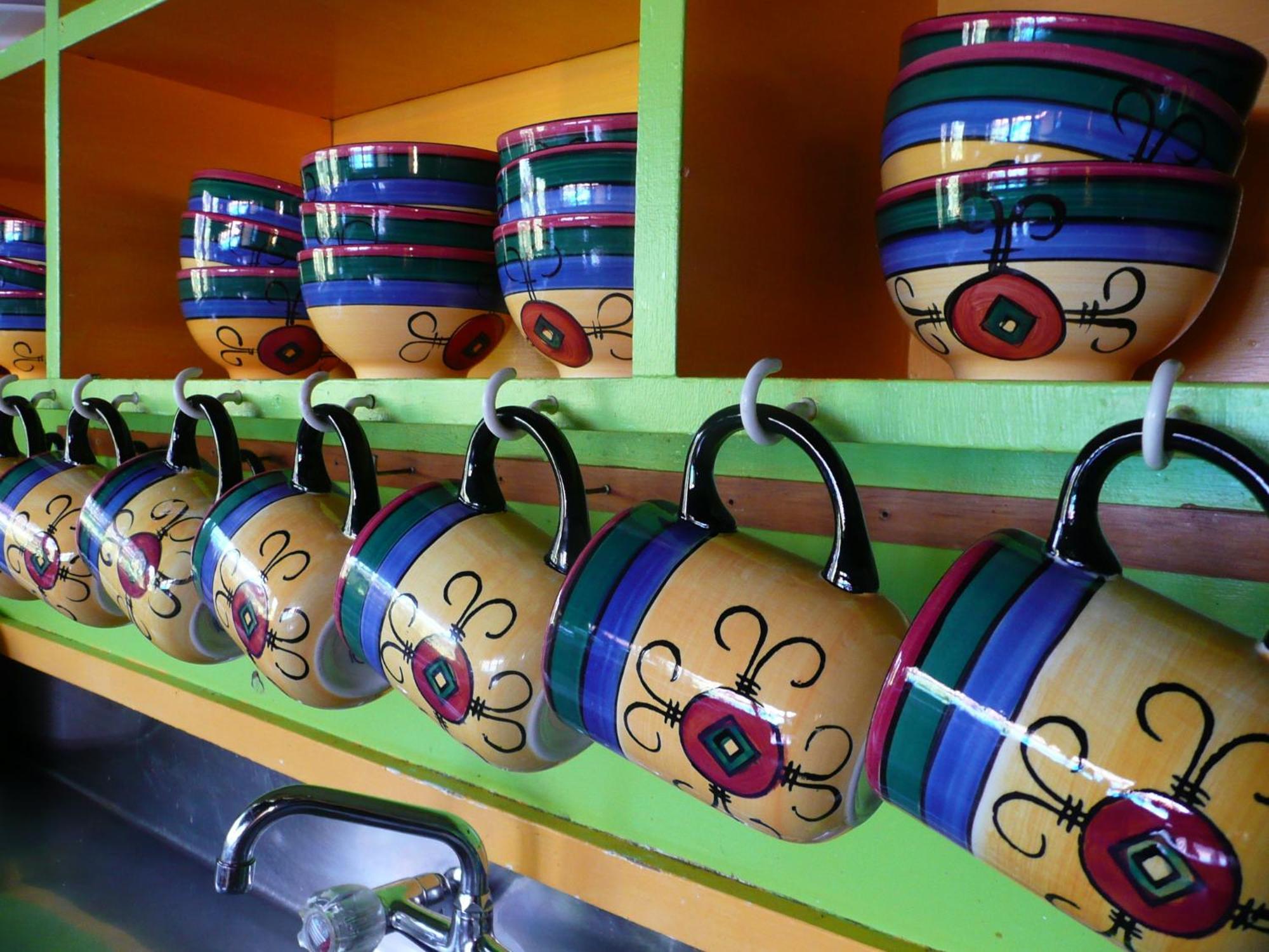 Global Village Travellers Lodge Greymouth Exterior photo A typical display of coffee mugs at a Panera Bread