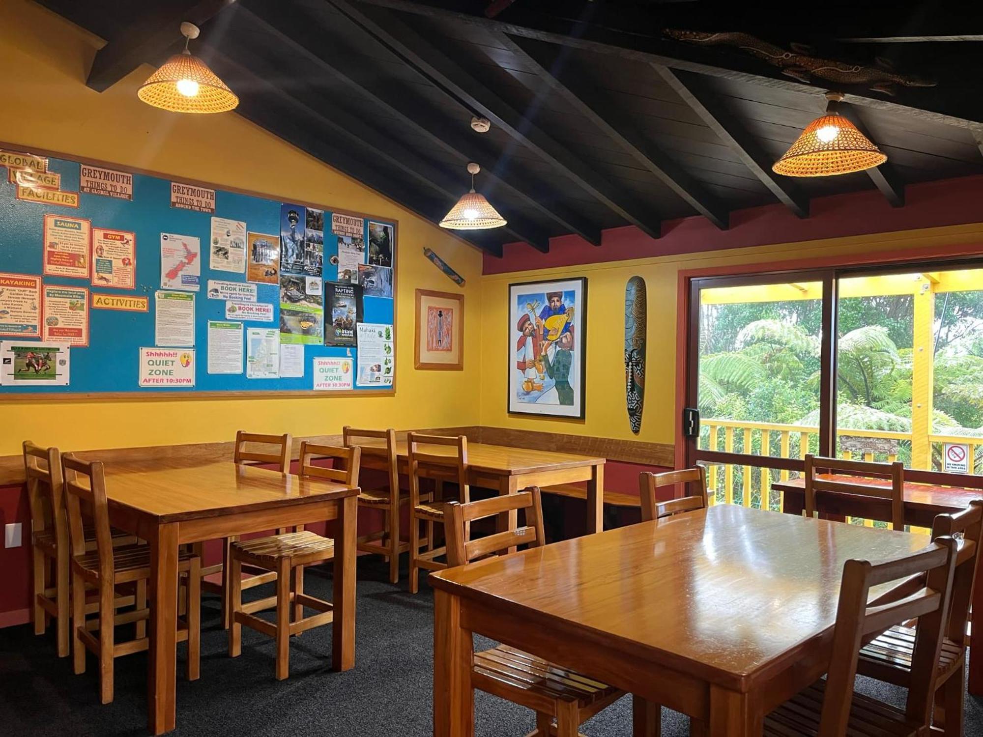 Global Village Travellers Lodge Greymouth Exterior photo The interior of the cafe at the centre