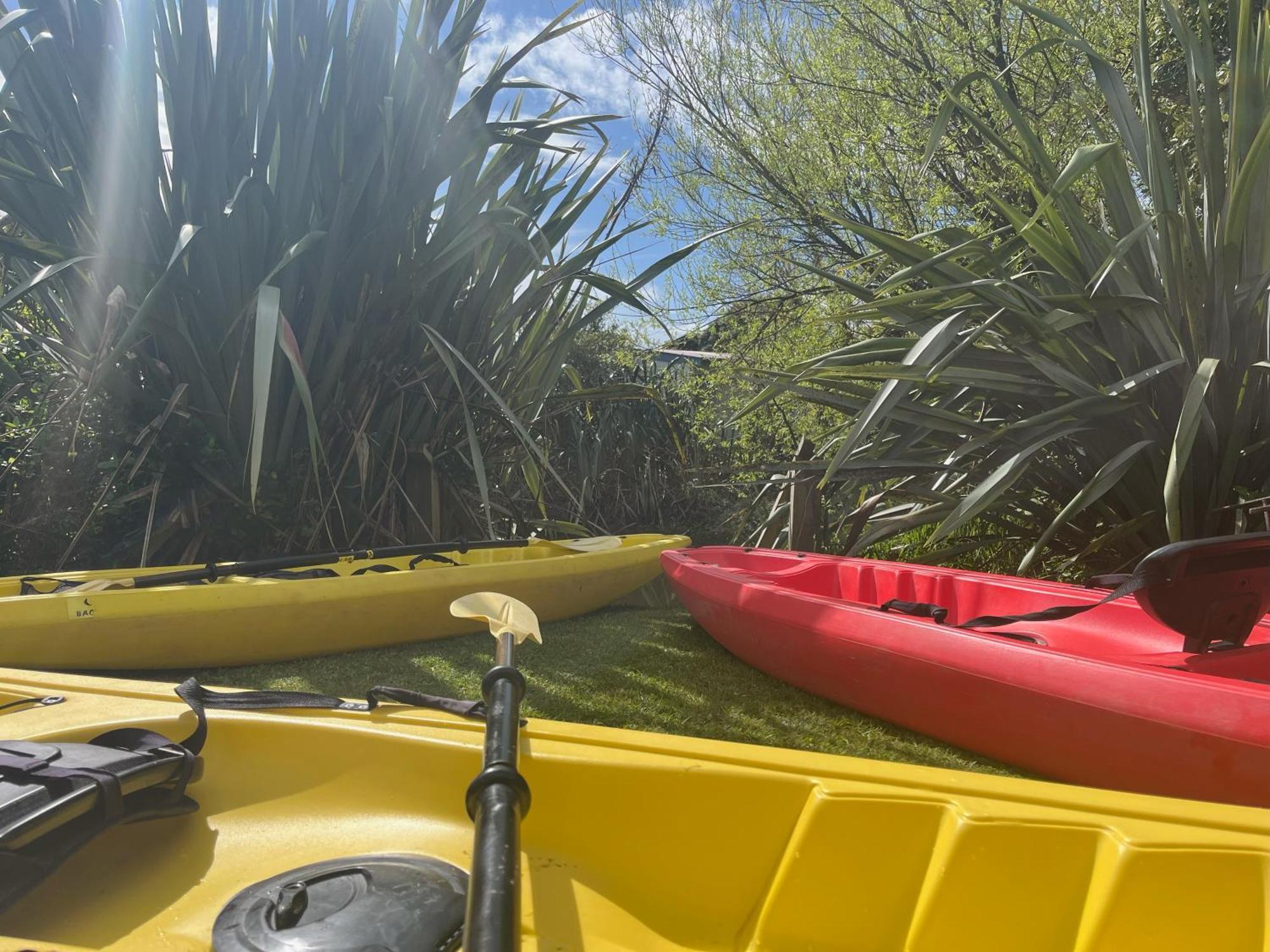 Global Village Travellers Lodge Greymouth Exterior photo Kayaks at the start of the trip