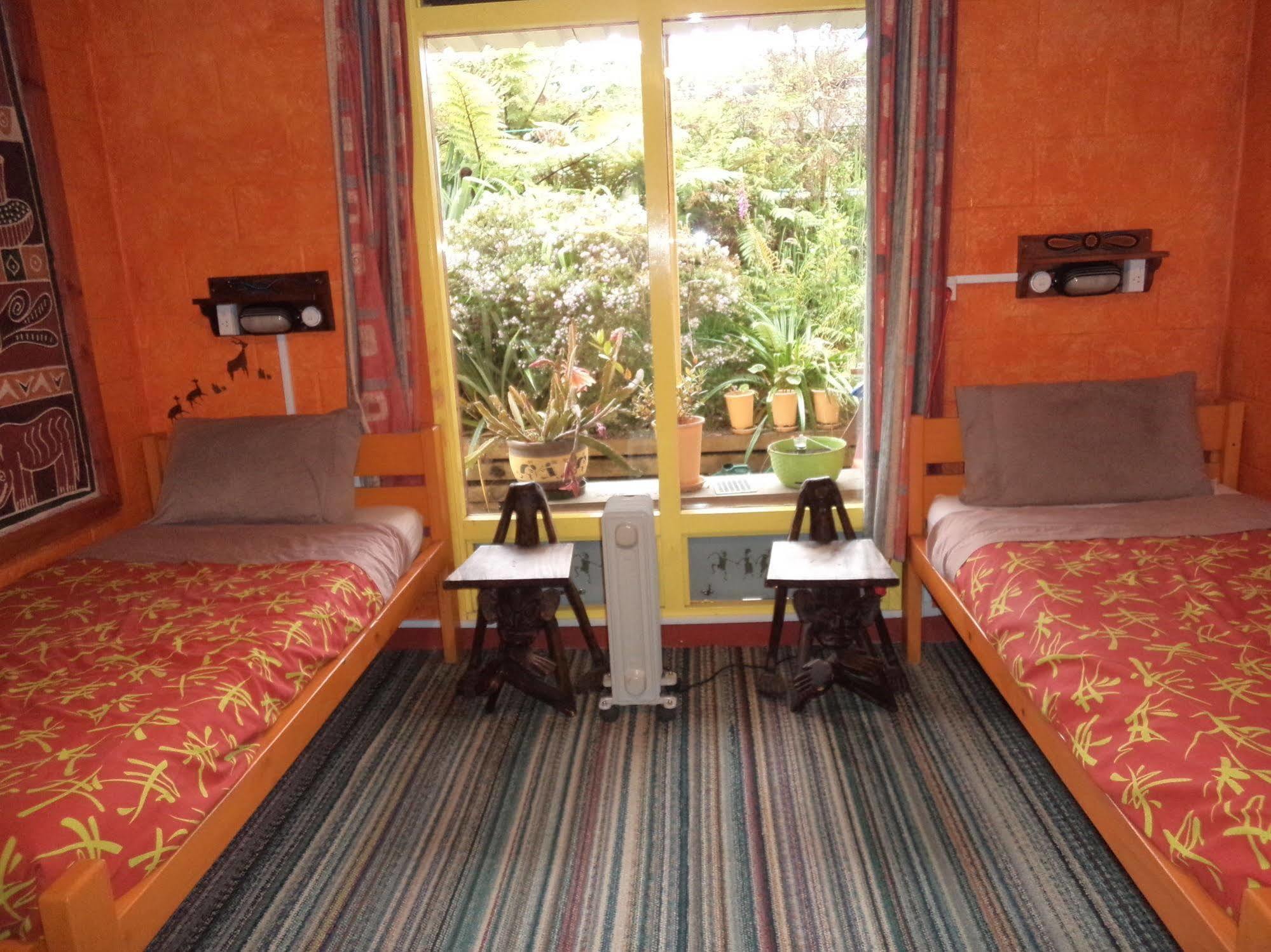 Global Village Travellers Lodge Greymouth Exterior photo A typical room at the hostel